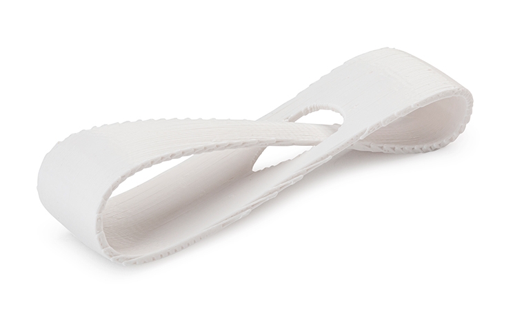 A white 3D-printed loop made from ABS using fused deposition modeling with a normal finish.