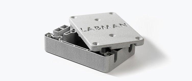 3D-printed box with "LABMAN" etched into the lid