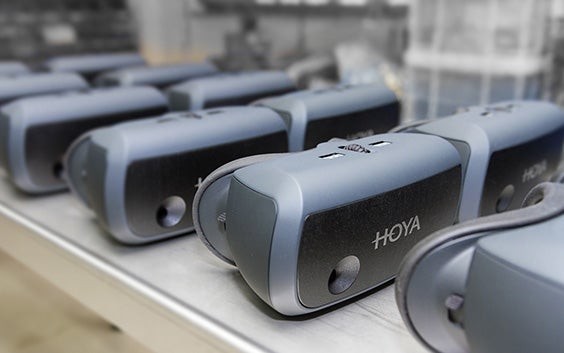 Rows of Hoya Vision Simulator headsets, whose housing is vacuum cast