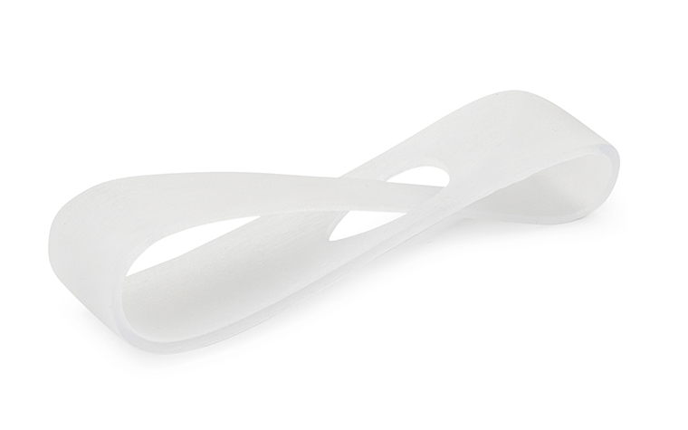 An opaque white 3D-printed loop made from VeroClear using PolyJet, with a basic finish.