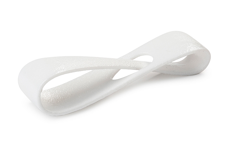 A white 3D-printed loop made from PA 12 using laser sintering, finished with a sealant.