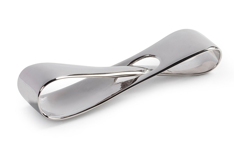 A brass infinity loop made with lost-wax casting and a polished + chrome-plated finish.