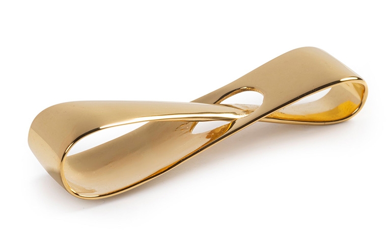A gold infinity loop made with lost-wax casting and a polished finish.