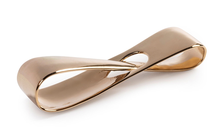 A bronze infinity loop made with lost-wax casting and a polished + PU coated finish.
